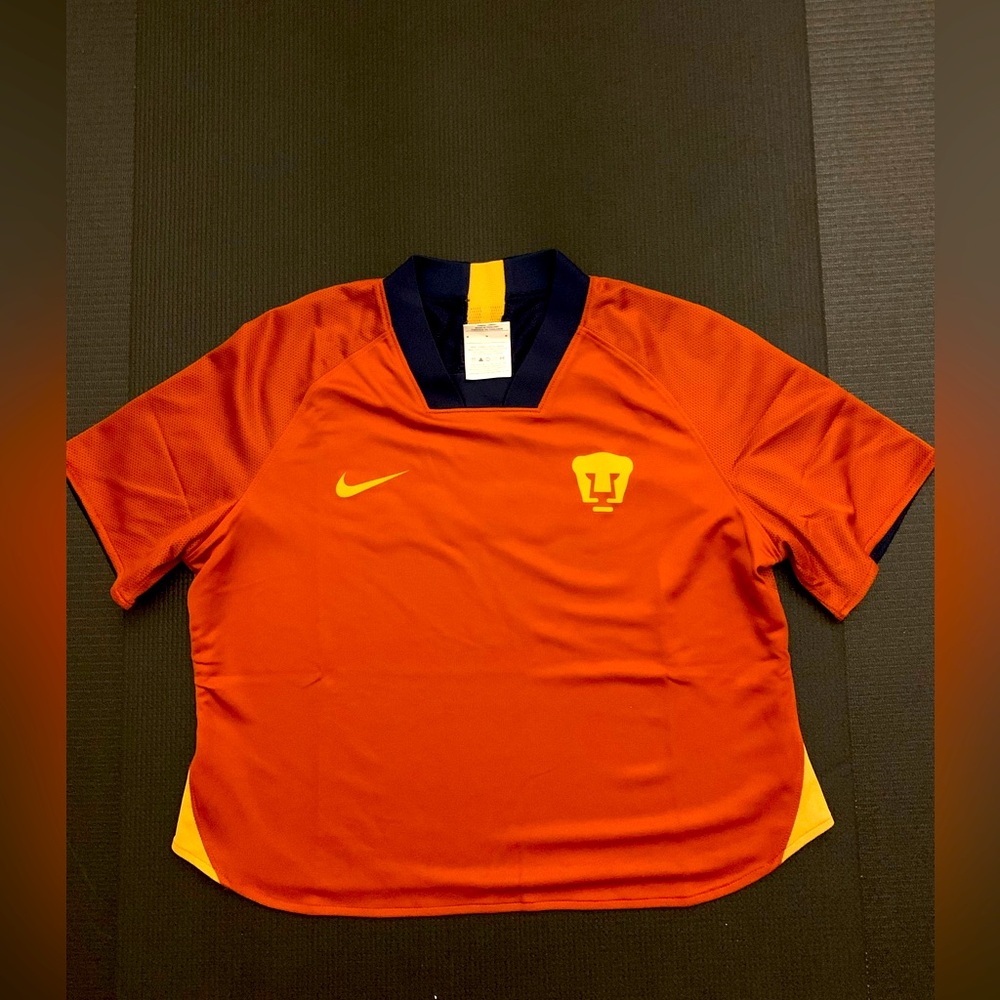 NWT Nike Puma soccer jersey. Size medium.